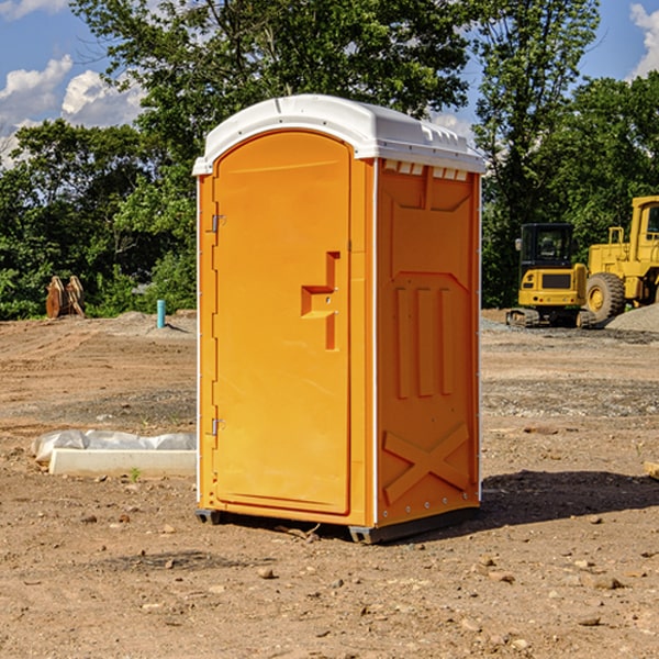 how often are the portable restrooms cleaned and serviced during a rental period in Russells Point